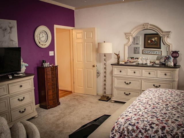 carpeted bedroom with crown molding