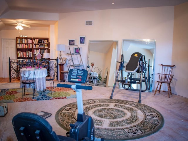 interior space with ceiling fan