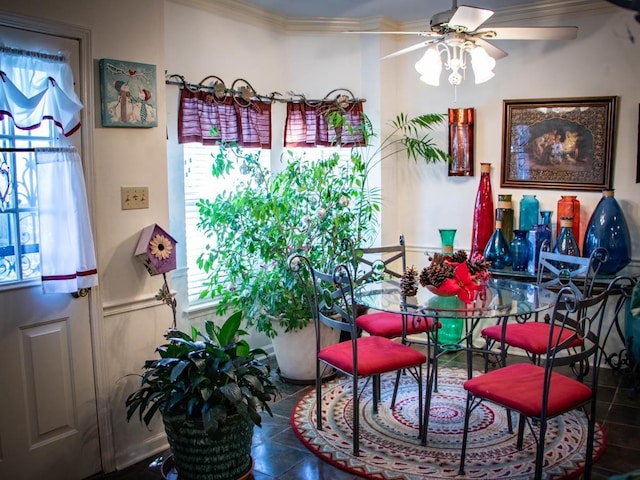 interior space with tile patterned floors and ceiling fan