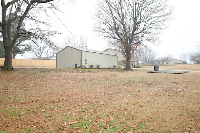 view of yard featuring central air condition unit