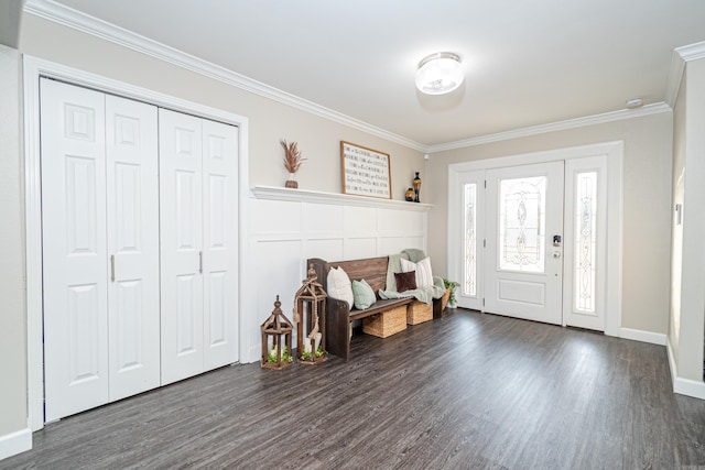 foyer featuring dark hardwood / wood-style flooring and crown molding