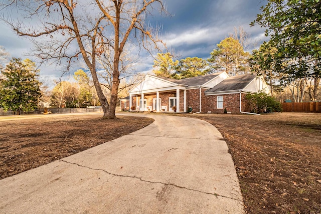 view of front of home featuring covered porch