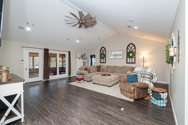 living room featuring vaulted ceiling and dark hardwood / wood-style floors