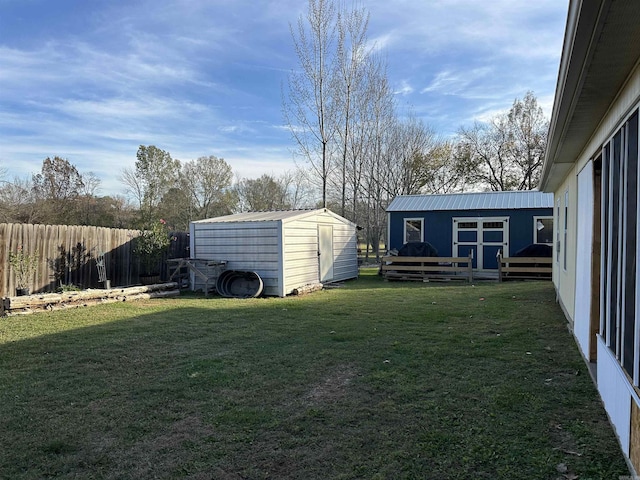 view of yard with a storage unit