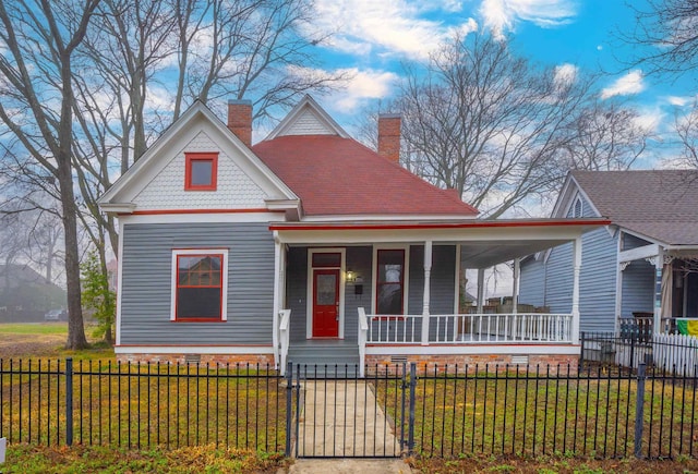 victorian home featuring covered porch