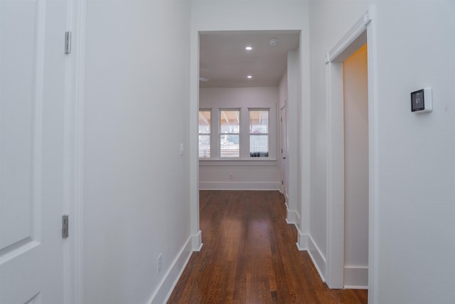 hallway featuring dark hardwood / wood-style floors