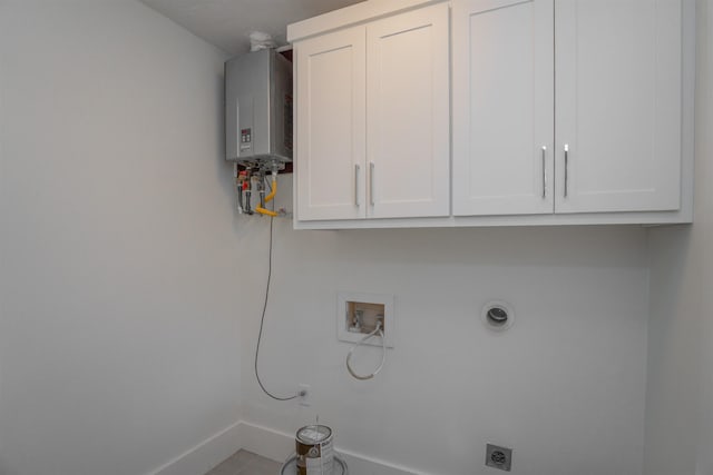 laundry room with gas dryer hookup, water heater, cabinets, washer hookup, and electric dryer hookup