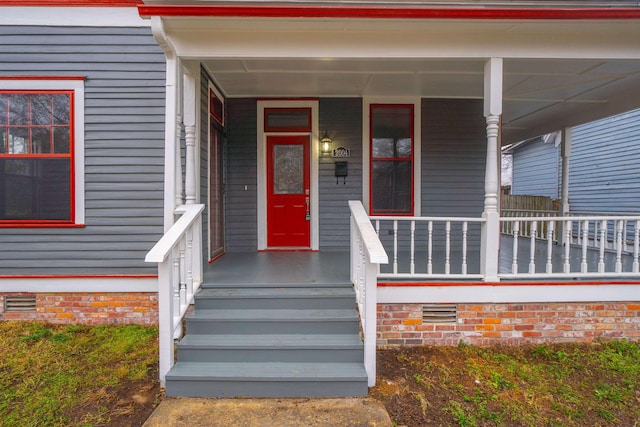 entrance to property with covered porch