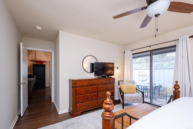 bedroom with ceiling fan, dark hardwood / wood-style floors, and access to outside