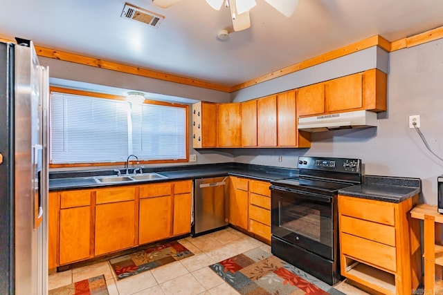 kitchen with light tile patterned flooring, ceiling fan, stainless steel appliances, and sink