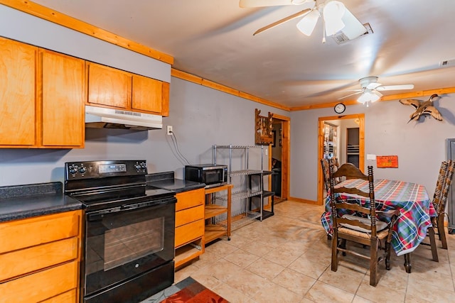 kitchen with black range with electric stovetop, ceiling fan, and light tile patterned flooring