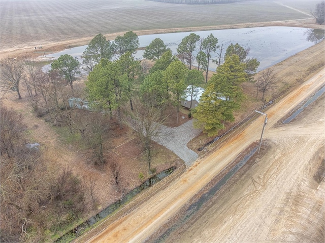 bird's eye view with a water view and a rural view