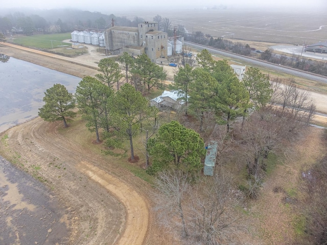 birds eye view of property with a rural view