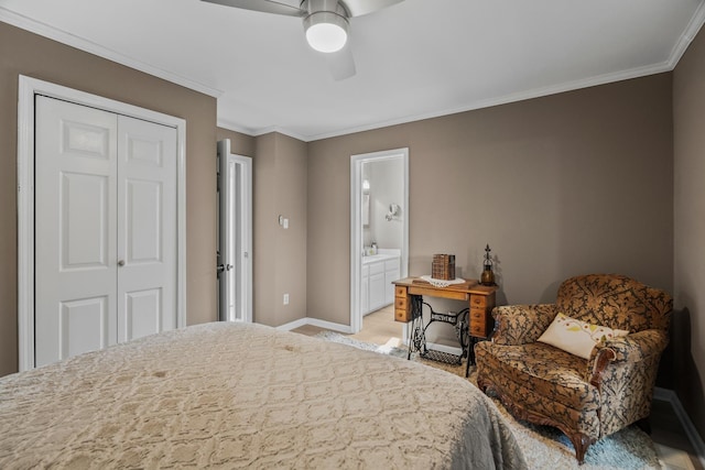 bedroom with crown molding, ensuite bathroom, ceiling fan, and a closet