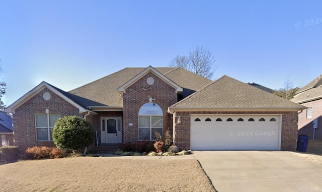 ranch-style home featuring a garage