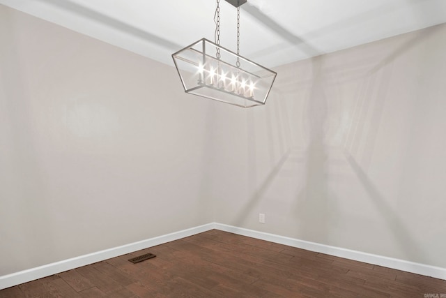 unfurnished dining area featuring hardwood / wood-style floors