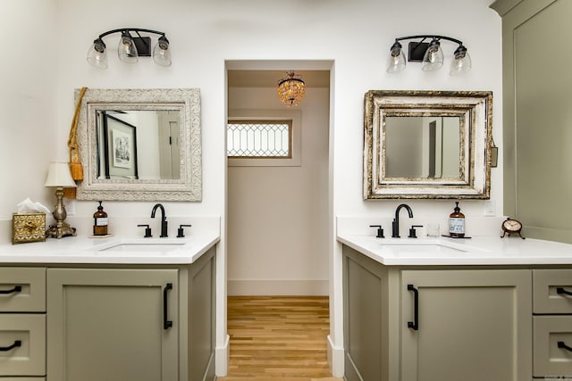 bathroom with vanity and hardwood / wood-style floors