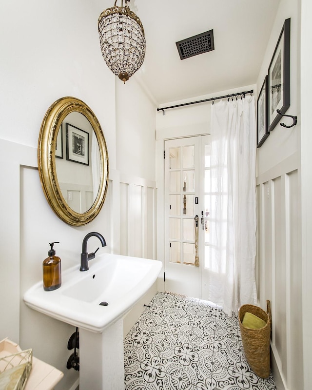 bathroom with tile patterned flooring