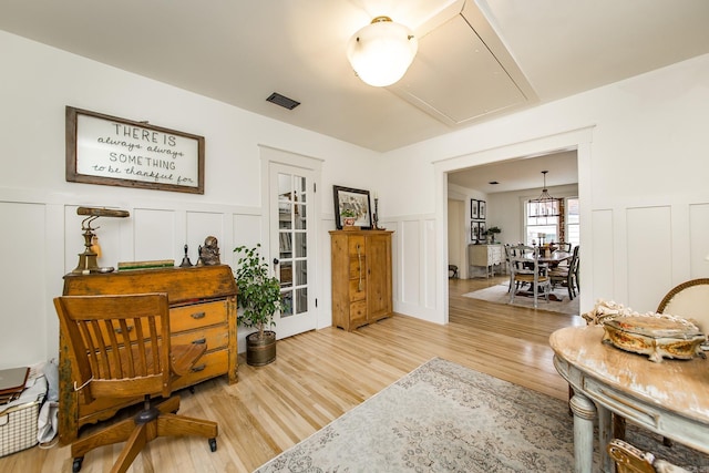 sitting room with light wood-type flooring