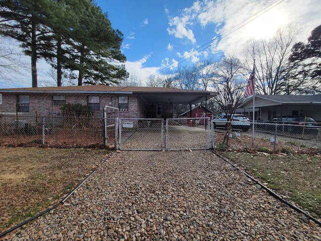 back of property featuring a carport