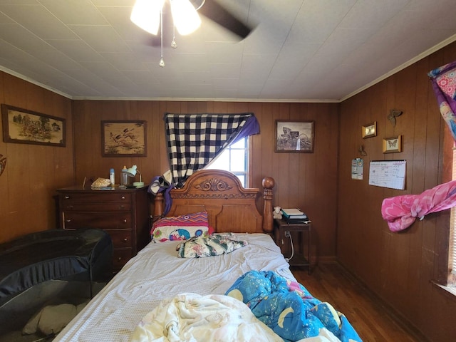 bedroom featuring dark hardwood / wood-style floors and ceiling fan