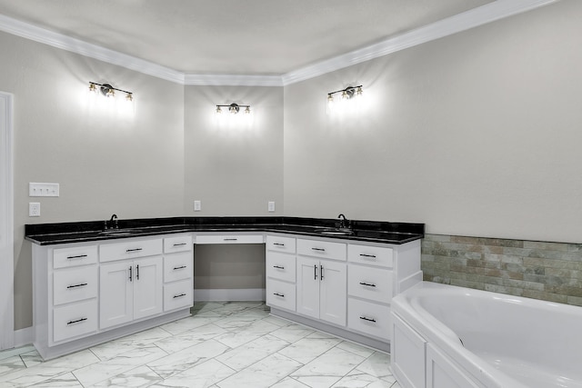 bathroom featuring vanity, ornamental molding, and a bathing tub