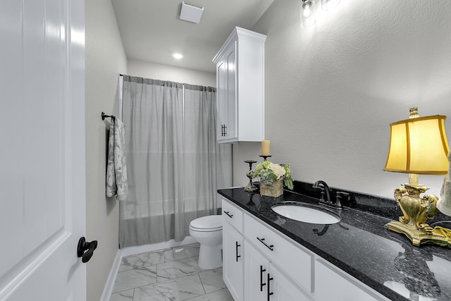 full bathroom featuring vanity, shower / bath combination with curtain, and toilet