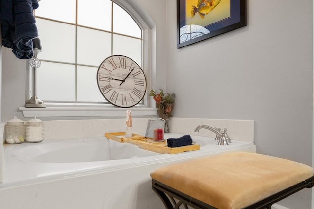 bathroom featuring a bath