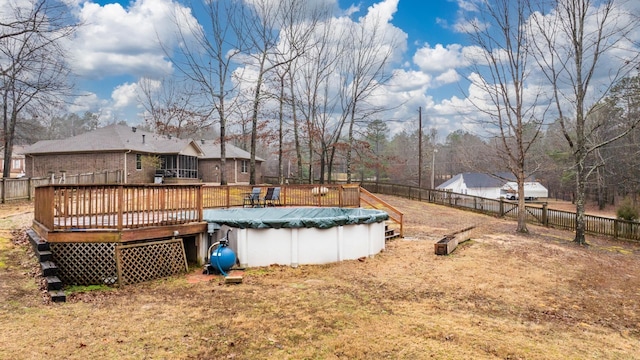 view of yard featuring a pool side deck