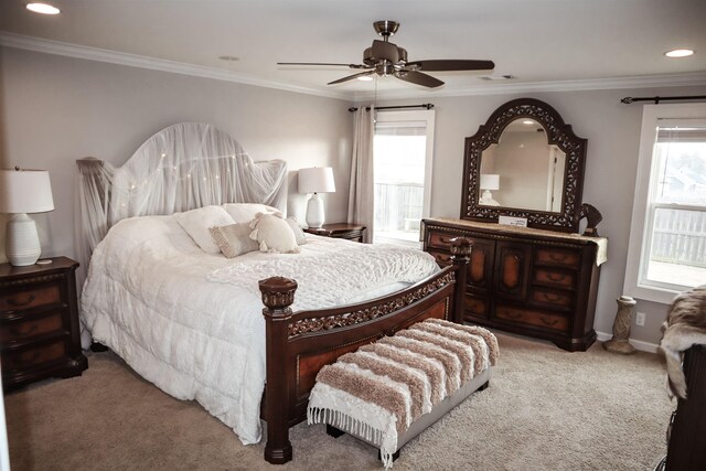 bedroom with ceiling fan, ornamental molding, and carpet