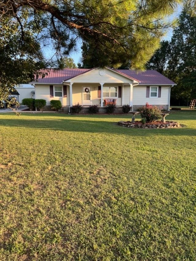 ranch-style house with a front lawn