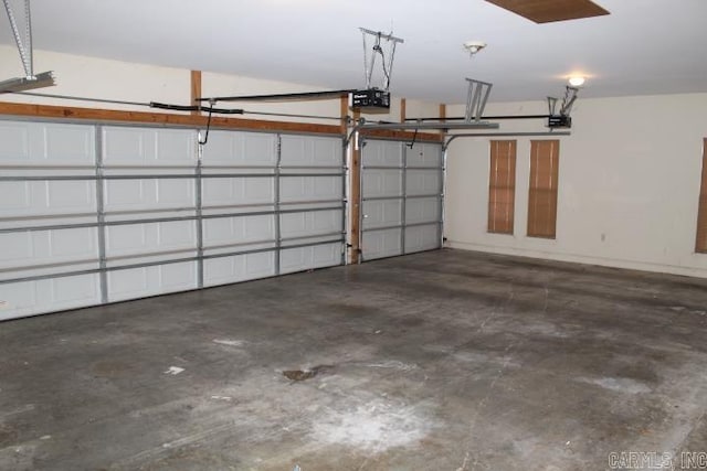 garage featuring a garage door opener