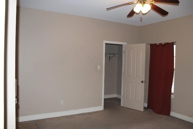 unfurnished bedroom with light colored carpet, a closet, and ceiling fan