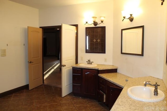 bathroom with vanity and tile patterned floors