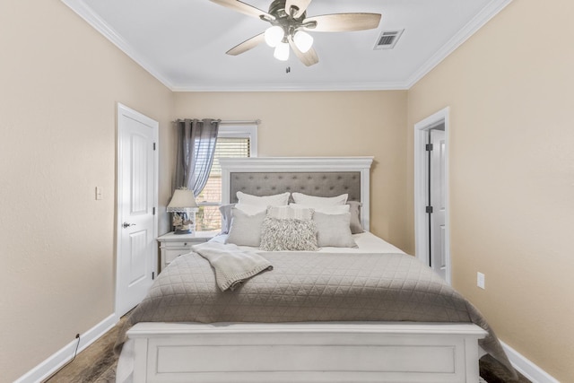 bedroom with ornamental molding, wood-type flooring, and ceiling fan