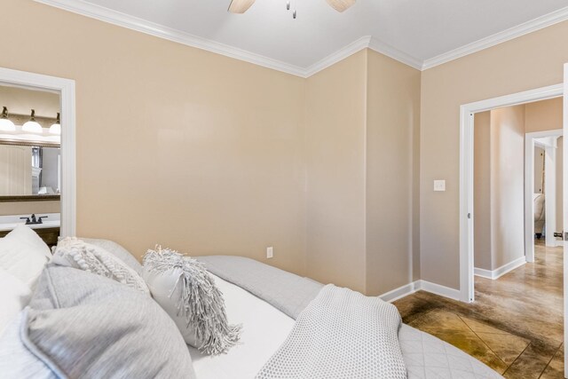 bedroom with ceiling fan and ornamental molding