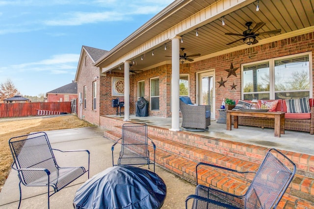 view of patio featuring area for grilling, an outdoor hangout area, and ceiling fan