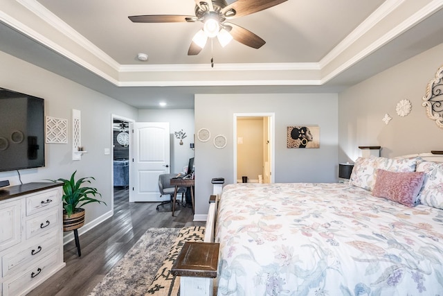 bedroom with a raised ceiling, crown molding, ceiling fan, and dark hardwood / wood-style flooring