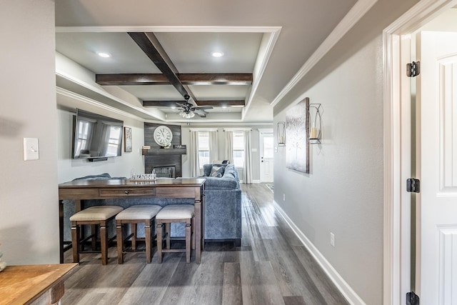 kitchen with coffered ceiling, beam ceiling, dark hardwood / wood-style flooring, and ceiling fan