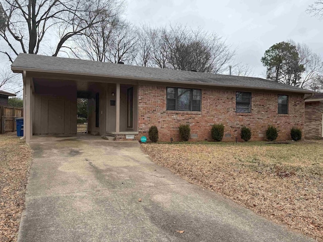 single story home with a carport