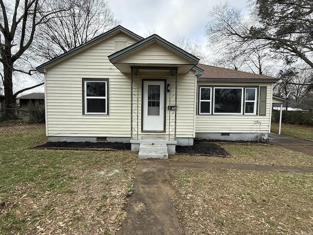 bungalow with a front yard