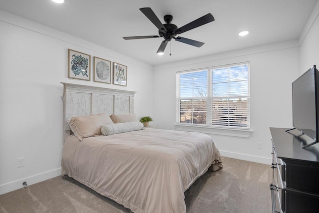 bedroom with ceiling fan and carpet floors