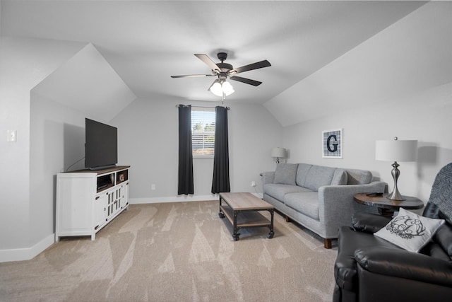 carpeted living room with lofted ceiling and ceiling fan