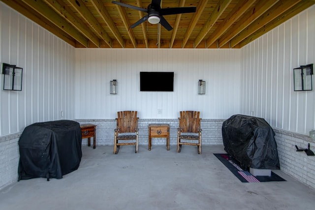 view of patio featuring area for grilling and ceiling fan