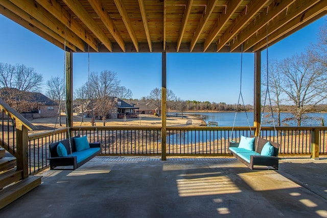 view of patio with a water view and an outdoor hangout area