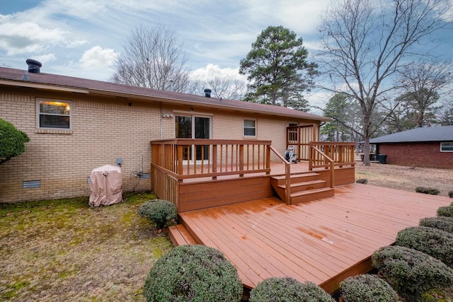 exterior space featuring a wooden deck