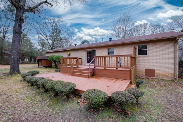 rear view of house with a deck