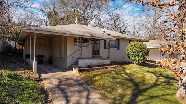 single story home with a carport and a front yard