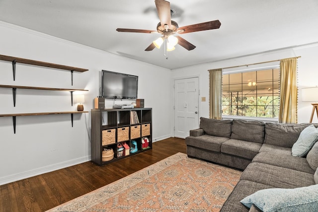 living room featuring ceiling fan and dark hardwood / wood-style flooring