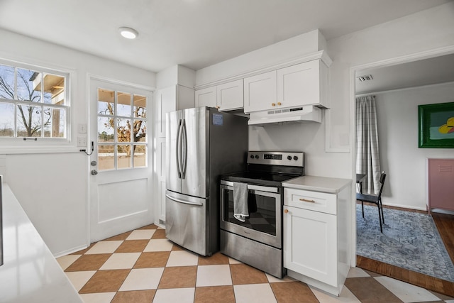 kitchen with white cabinetry and stainless steel appliances